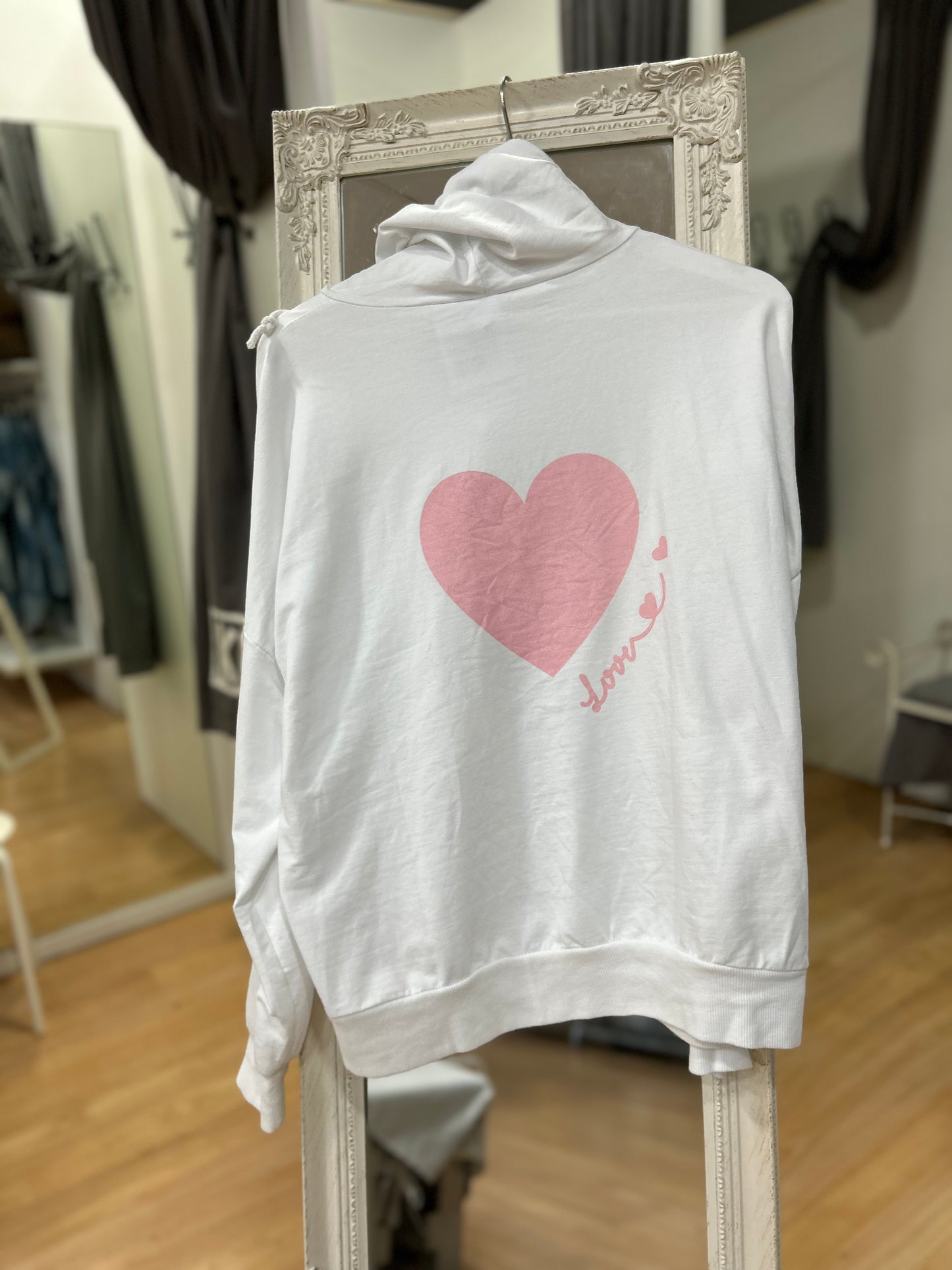 Sudadera corazón rosa